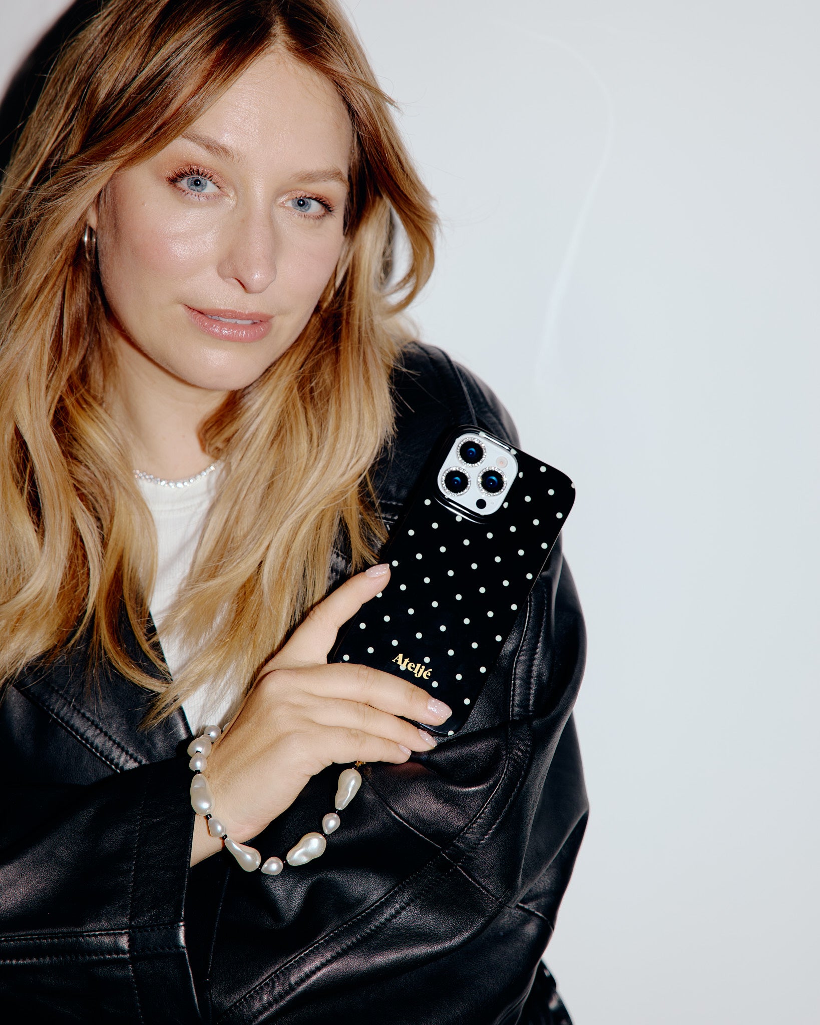 Black polkadot case with The noir cord