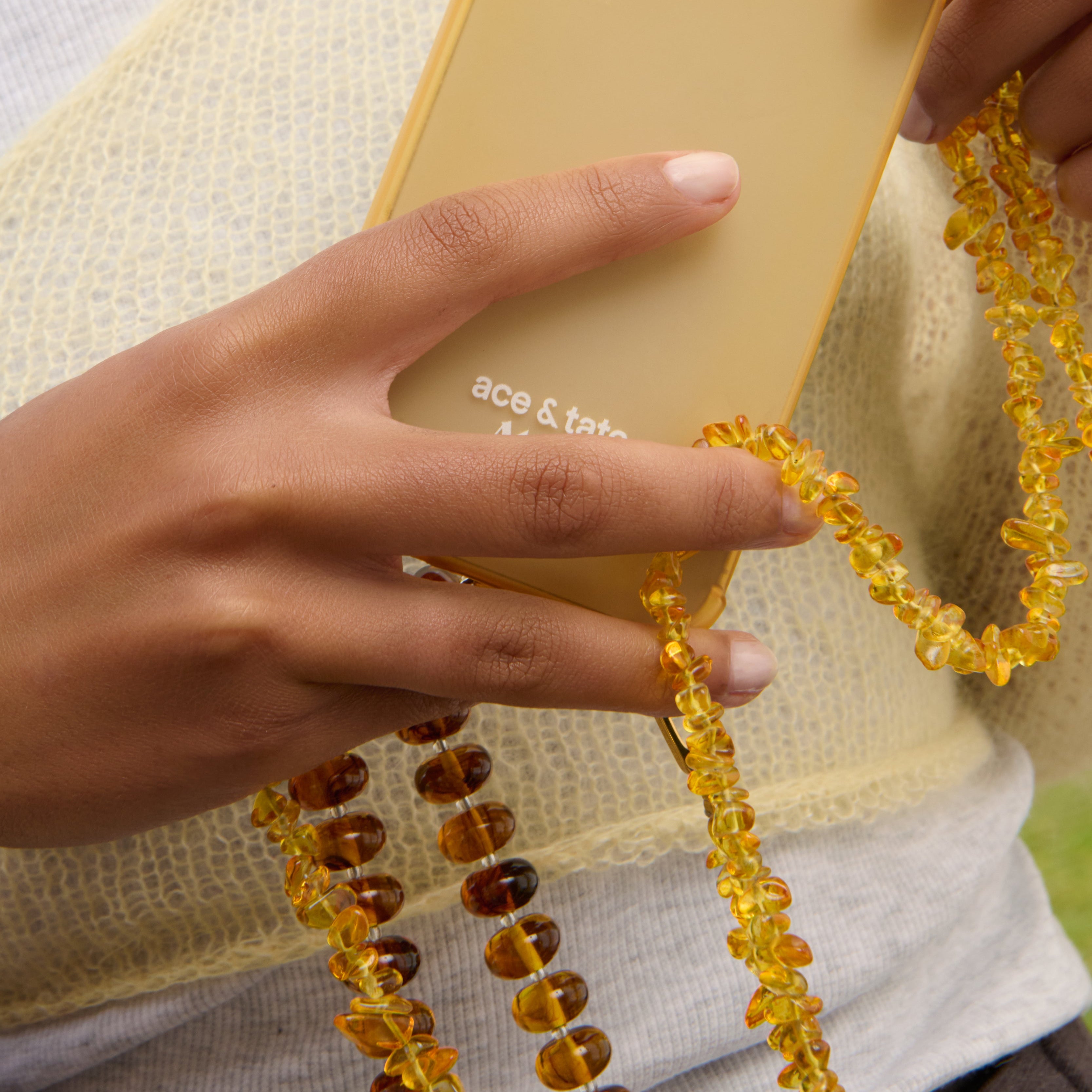 Mellow yellow iPhone case with Sunbeads and Honeycomb cord