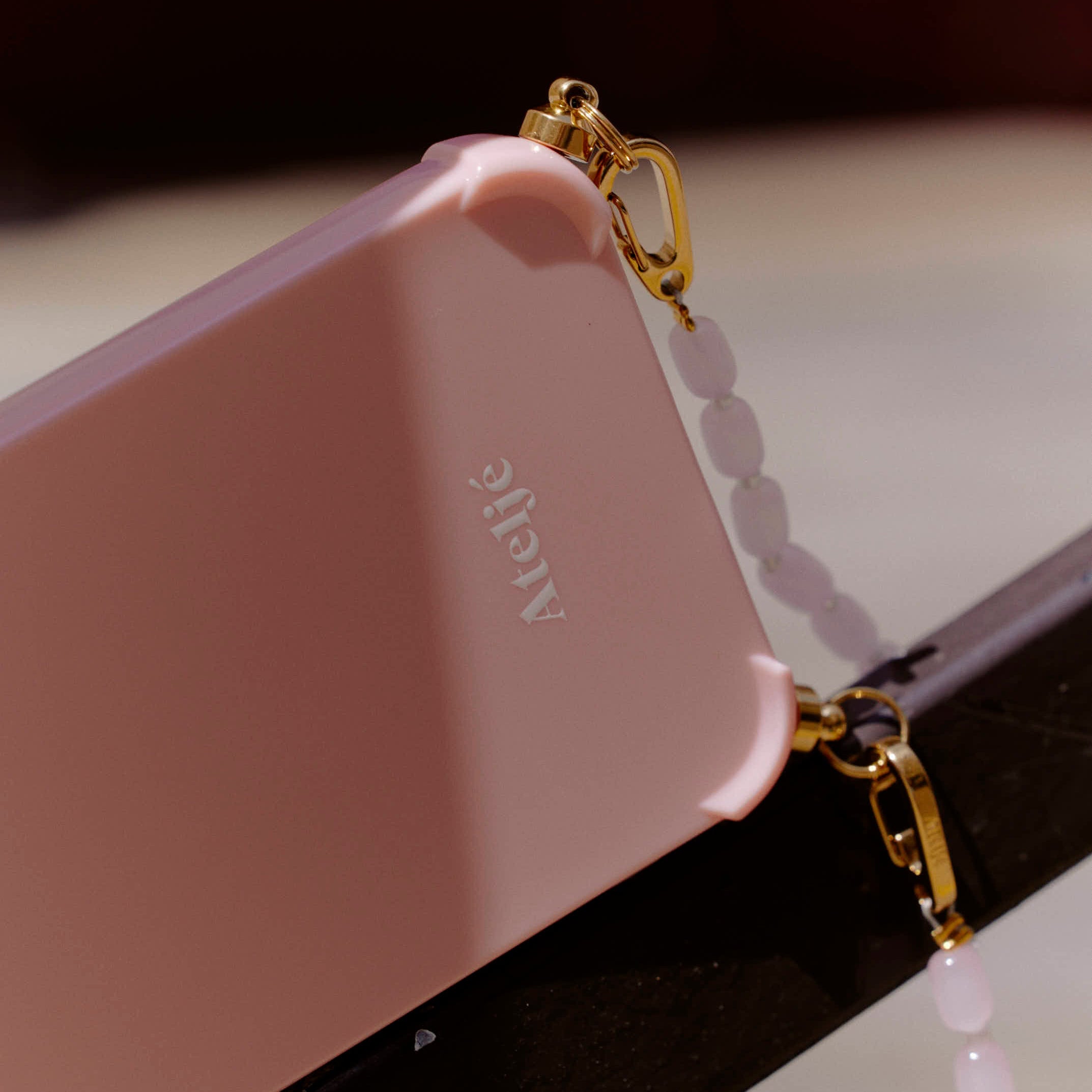 Pink clay recycled iPhone case with Cloudy 2.0 cord