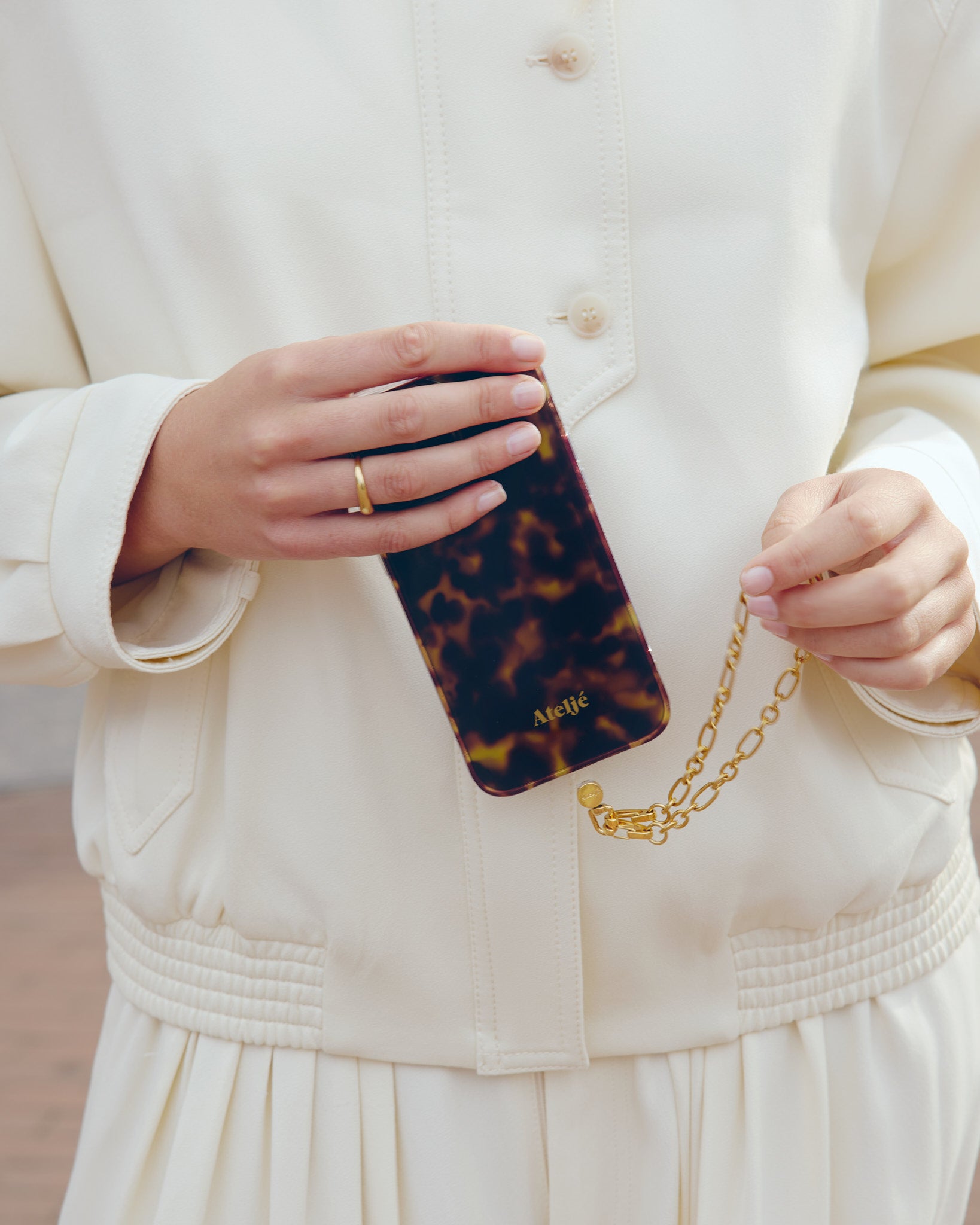 Tortoise case with Cosmic gold cord