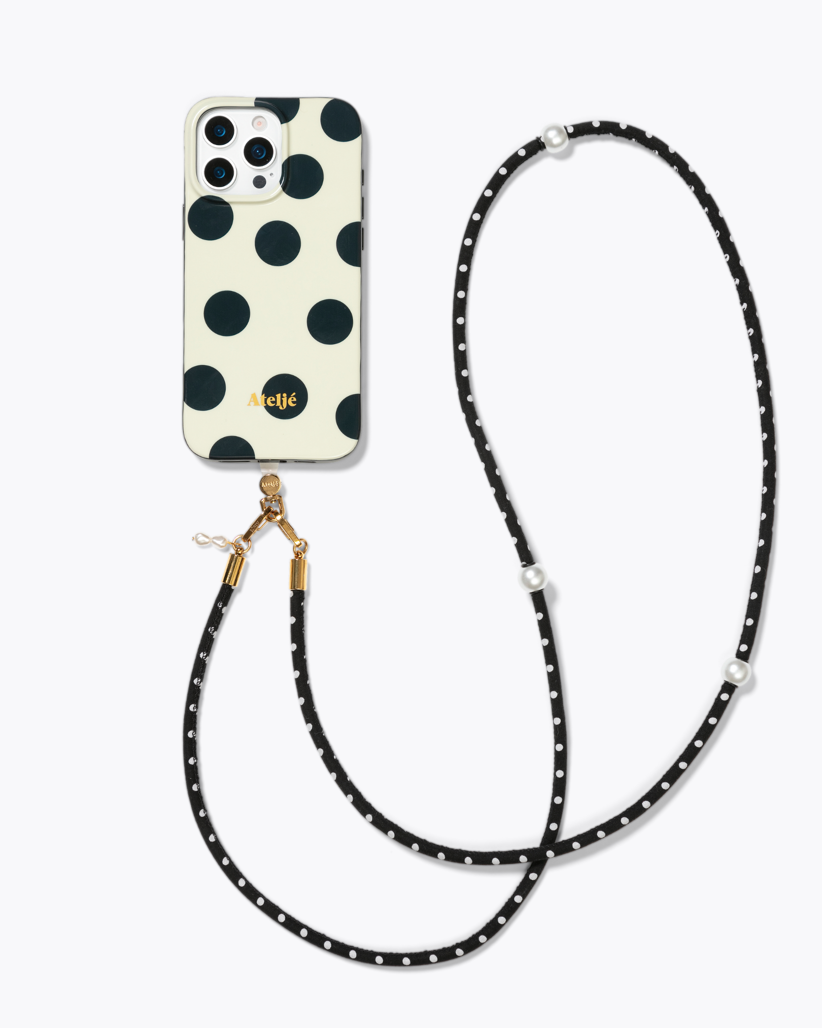 Ivory polkadot case with Hit the spot cord