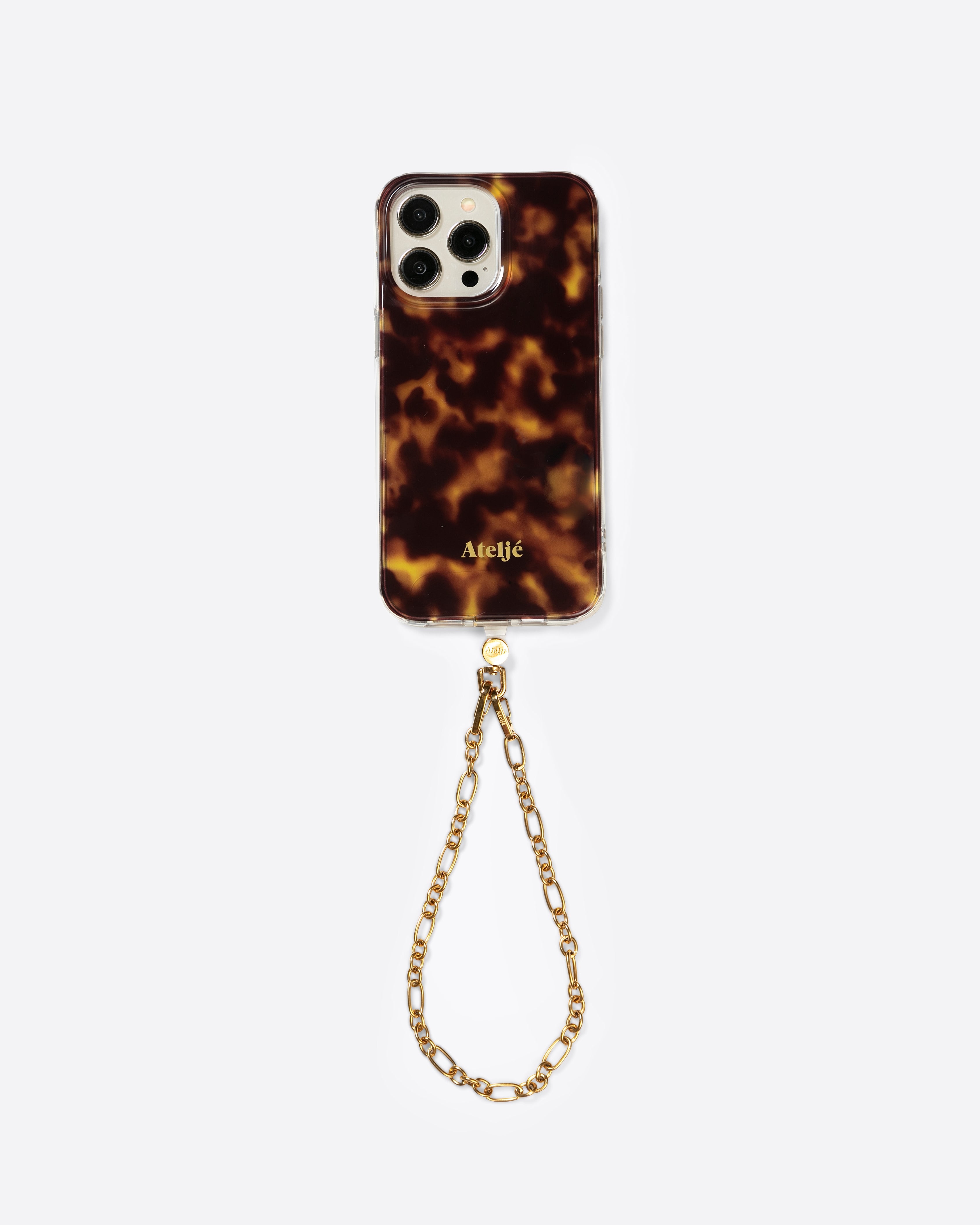 Tortoise case with Cosmic gold cord