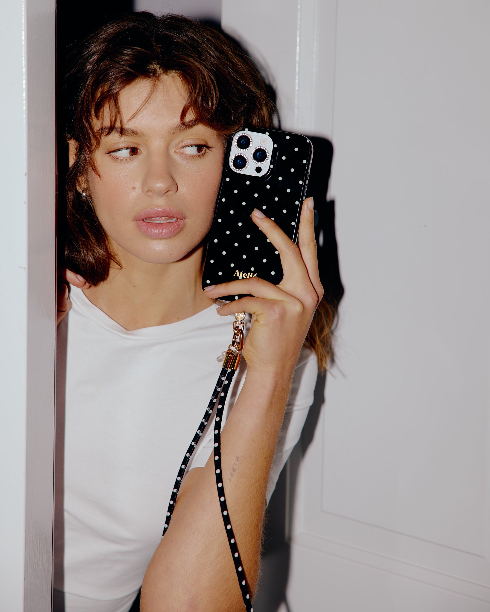 Black polkadot case with Hit the spot cord