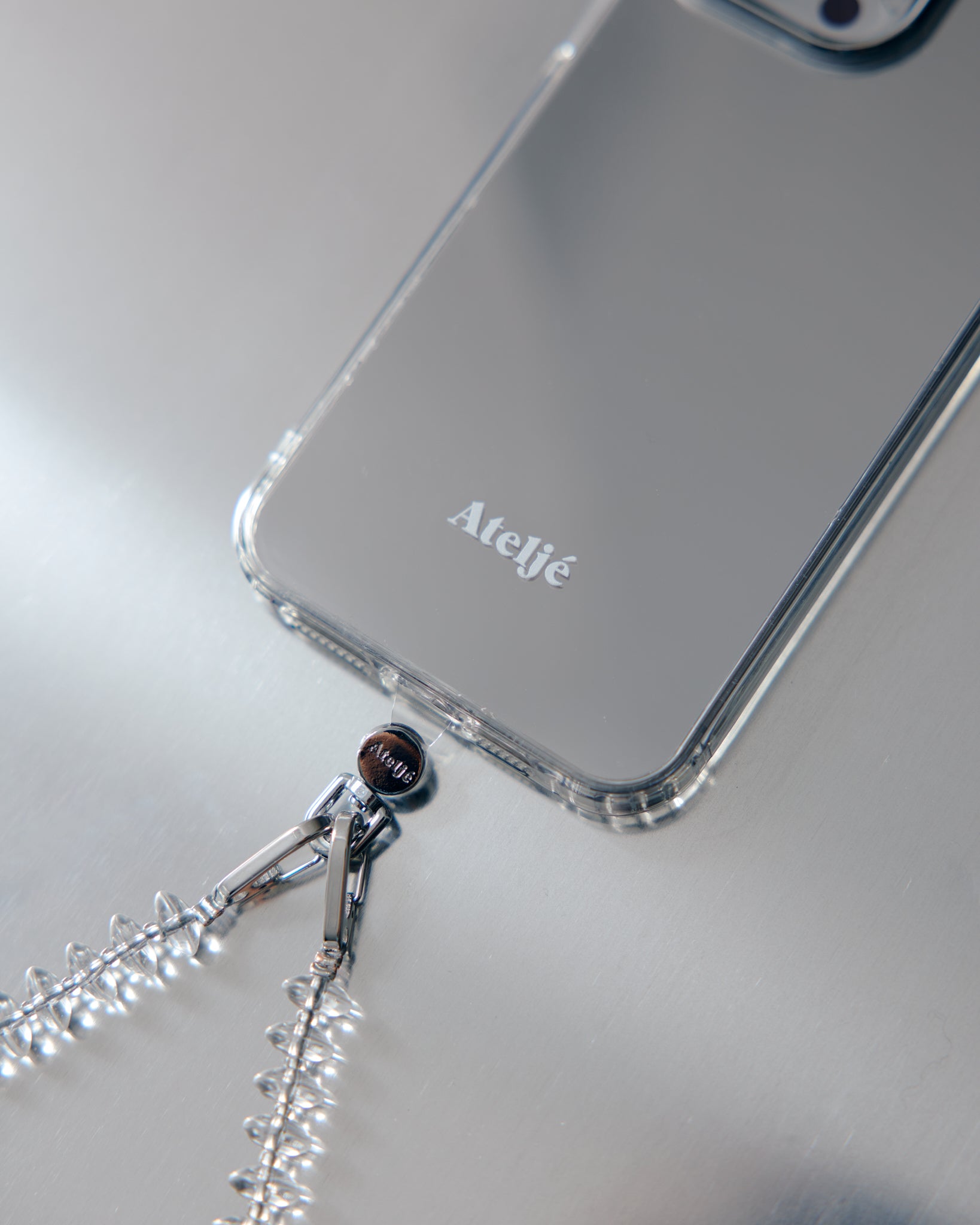 Phone cord connector - silver