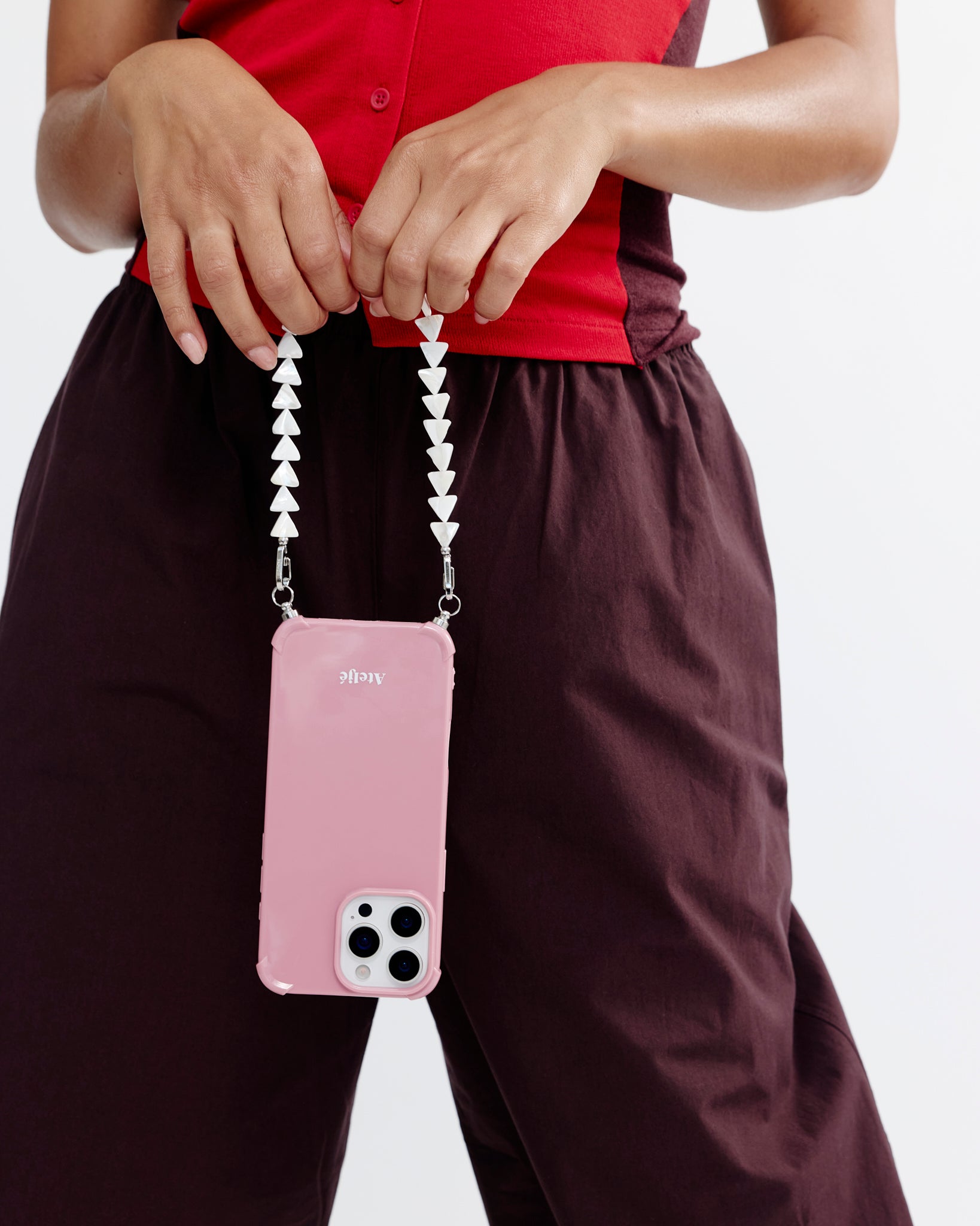 Velvet pink recycled iPhone case with First light cord