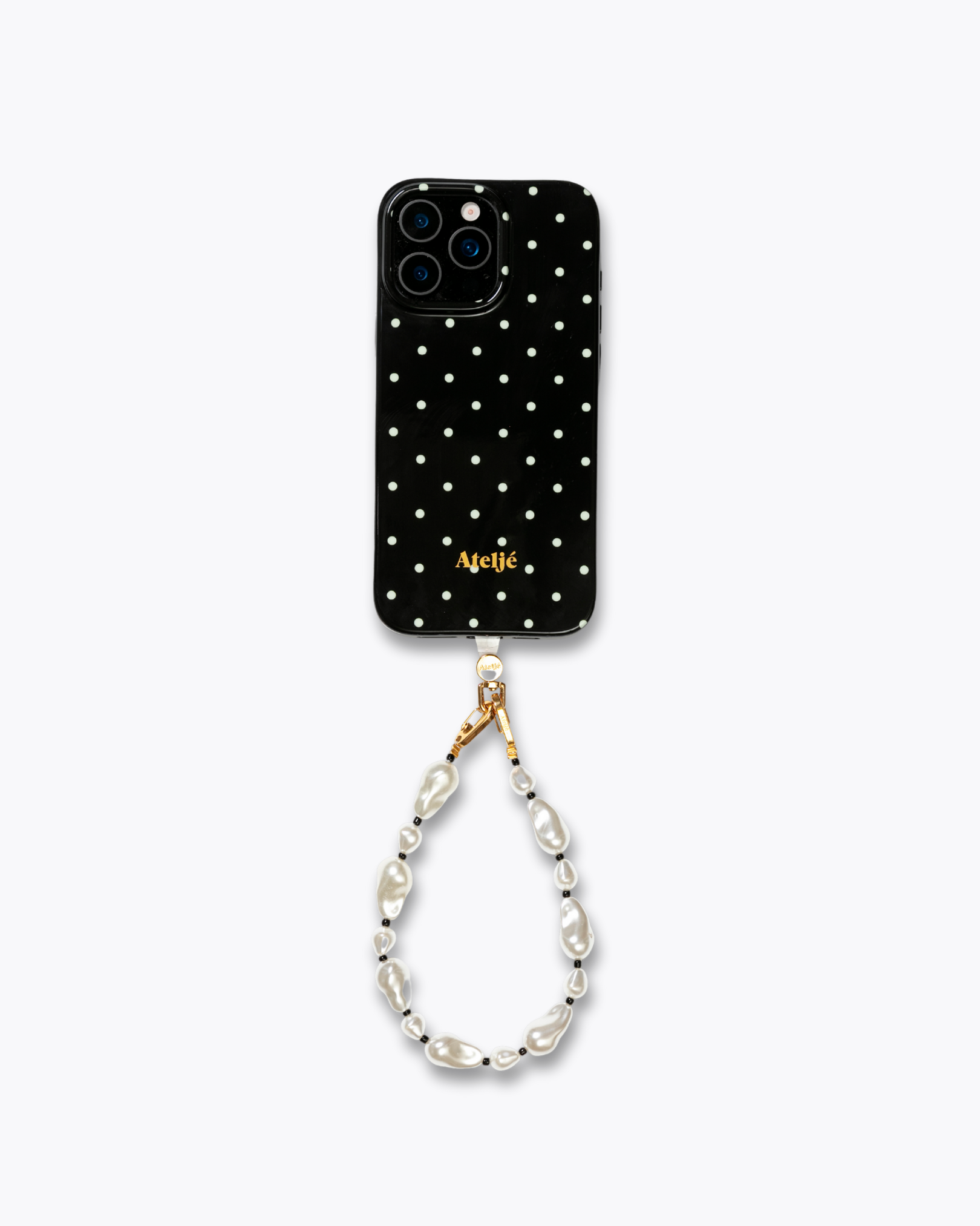 Black polkadot case with The noir cord