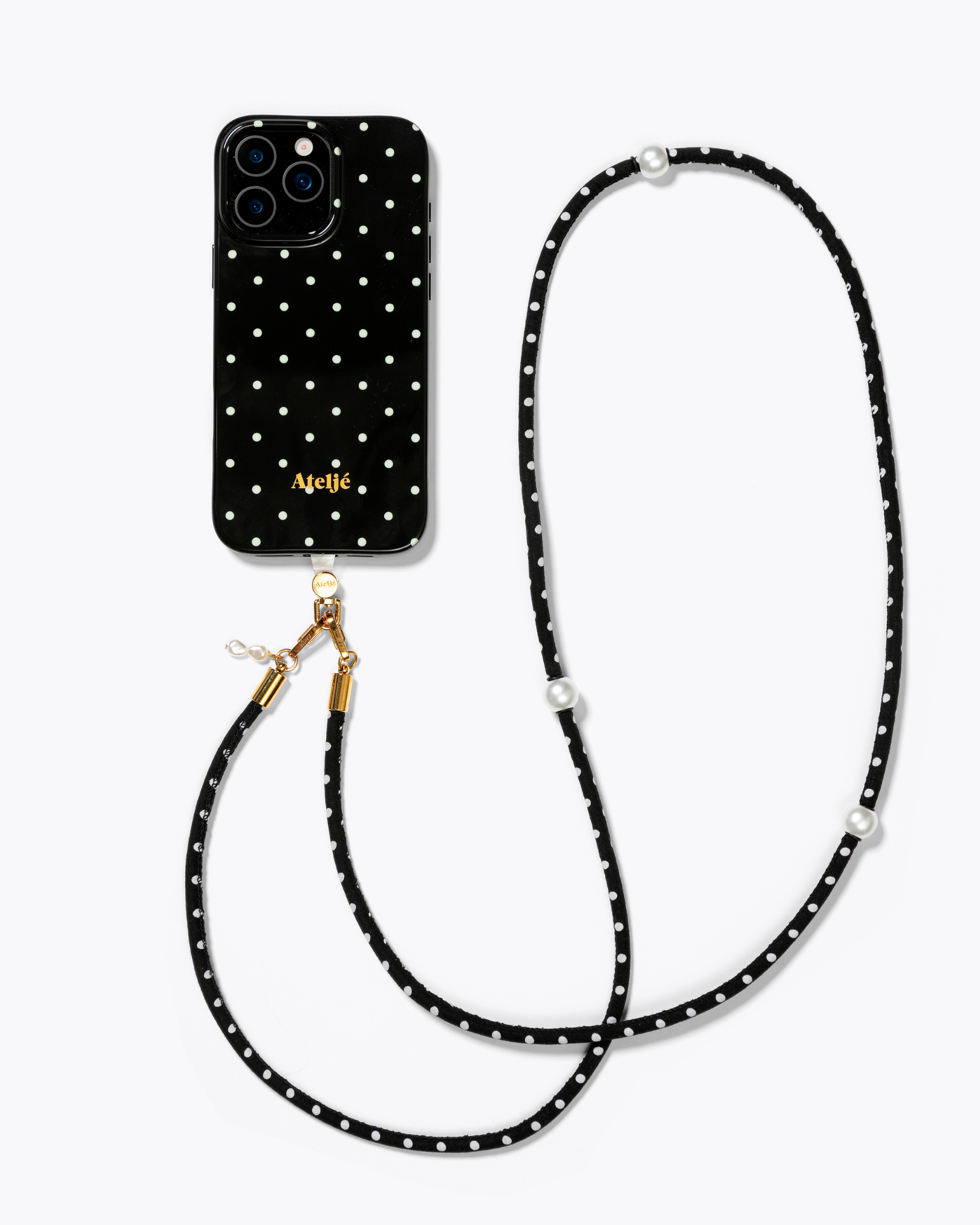 Black polkadot case with Hit the spot cord