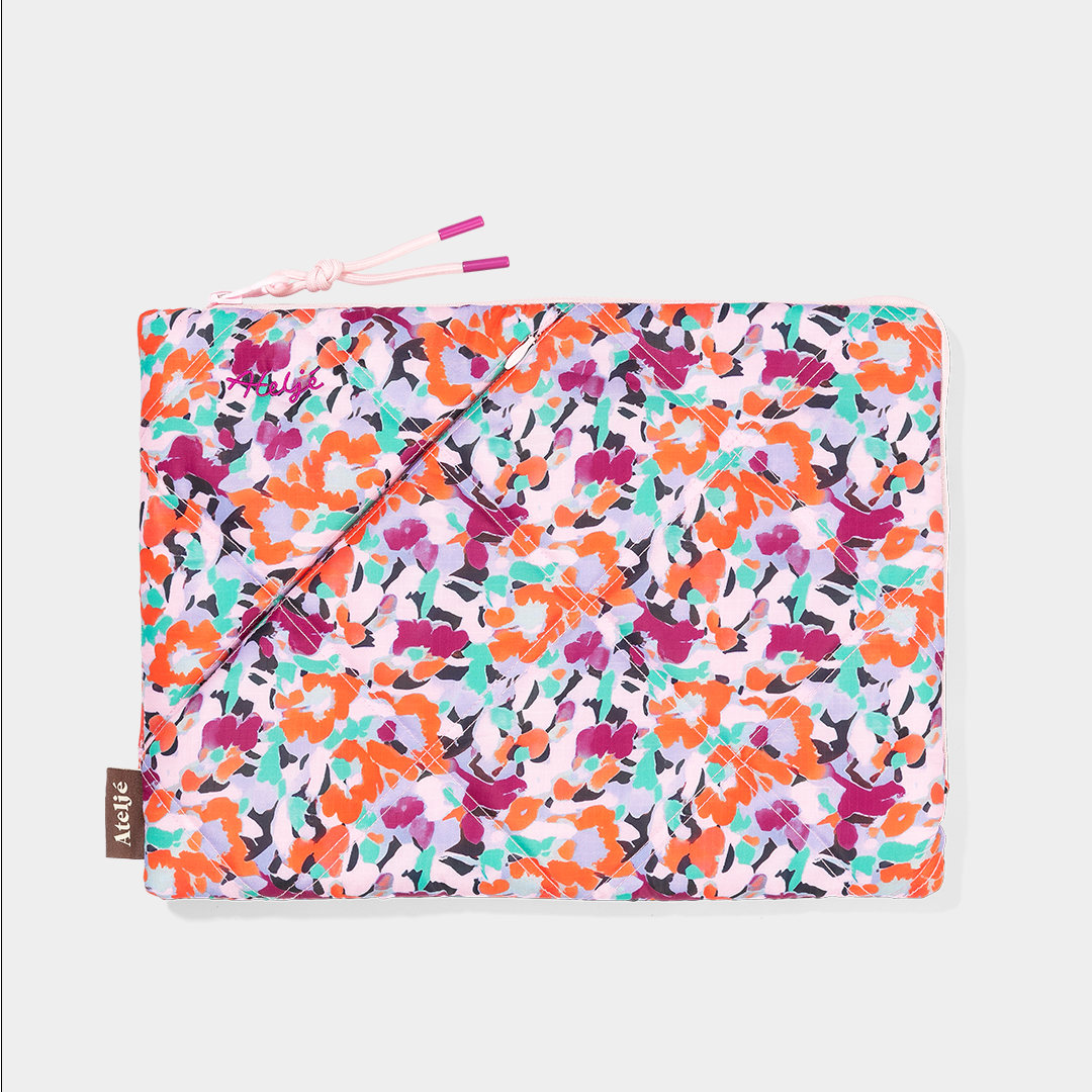 Puffy recycled laptop sleeve | Flower field