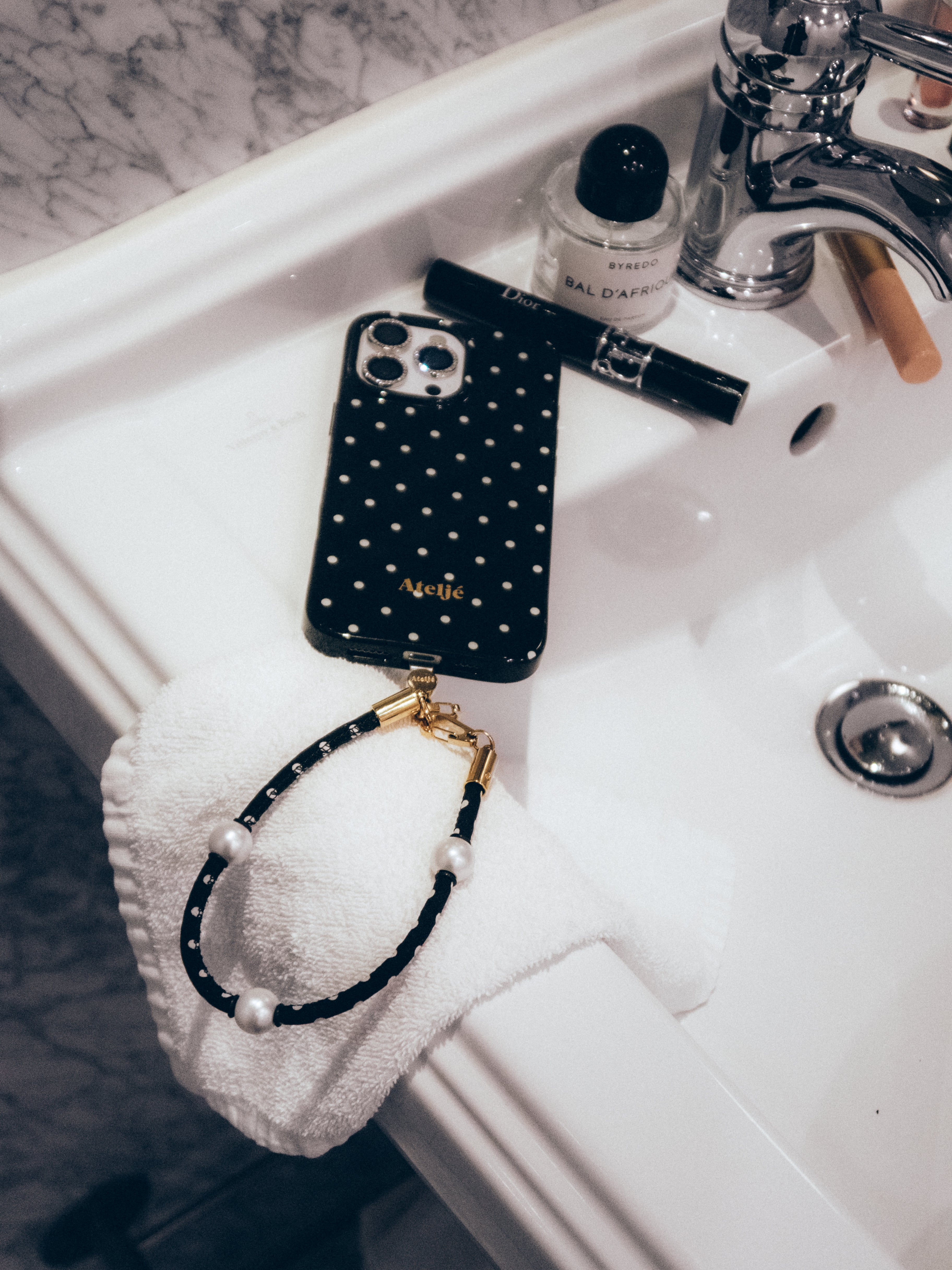 Black polkadot case with Polka cord