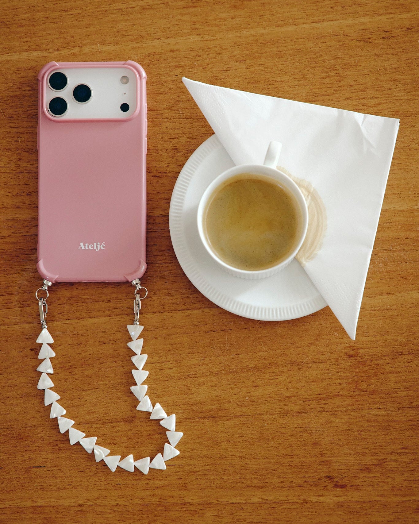 Velvet pink recycled iPhone case with First light cord